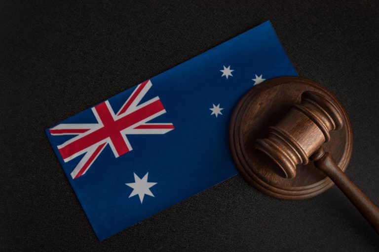 judge-gavel-near-australian-flag-court-australia-australian-auction-min